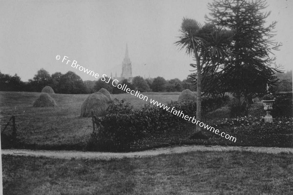 VIEW OF PARK WITH CHURCH SPIRE